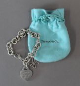 A Tiffany silver bracelet in a Tiffany bag (33.