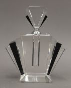 A large Art Deco style fan shaped glass scent bottle