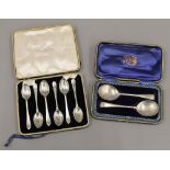 A cased set of silver teaspoons and a cased pair of preserved spoons (4.