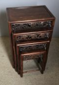 A late 19th century Chinese carved hardwood quartetto nest of tables,