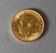 A boxed half sovereign,