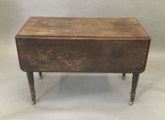 A Victorian mahogany drop-flap Pembroke table fitted with opposing drawers. 102 x 121 cm open, 71.