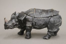 A cold painted bronze inkwell formed as a rhinoceros