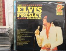 A quantity of vinyl LPs and 45s, including The Beatles, Elvis Presley, etc.