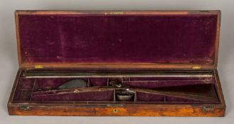 A Victorian double barrelled side by side percussion shotgun,