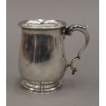 A silver Christening mug (7.
