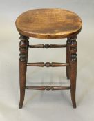 A 19th century stool with turned legs. 55 cm high.