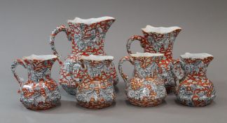 Six similar Mason's Ironstone jugs, various sizes,