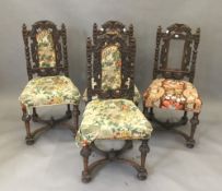 A set of four 19th century carved oak upholstered dining chairs,