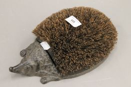 A hedgehog boot scraper