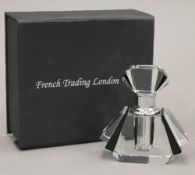 A small Art Deco style fan shaped glass scent bottle,