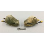 A pair of Schuco clockwork frogs
