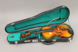 A modern cased violin