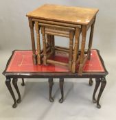 An oak nest of tables and a leather topped nest of tables