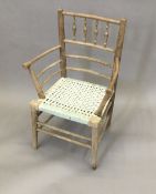 A Victorian child's Sussex armchair,