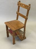 A Victorian oak metamorphic chair, of typical construction.