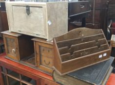 A late Victorian oak smokers cabinet, together with a stationery rack,