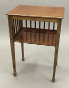 An Edwardian inlaid mahogany side table