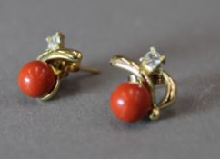 A pair of coral set earrings