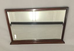 An Edwardian mahogany framed overmantle mirror