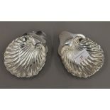 A pair of silver butter shells (3.