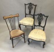 Two carved salon chairs,