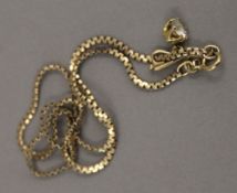 A 9 ct gold chain set with a pendant (the chain 4.