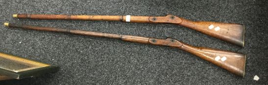 Two 19th century brass mounted 'Brown Bess' gun stocks