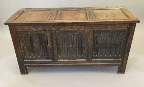 A 17th century carved oak three panel coffer. 134 x 51 cm, 71 cm high.