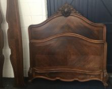 A 19th century French carved rosewood double bed
