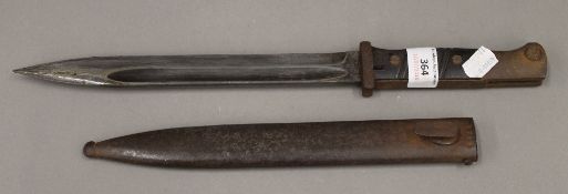 A German WWII knife bayonet and scabbard,