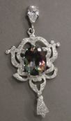 A silver and cubic zirconia pendant