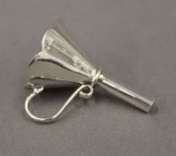 A silver model of a funnel