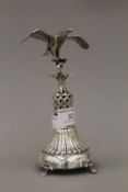 A Continental silver ornament in the form of an eagle with outstretched wings,