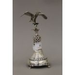 A Continental silver ornament in the form of an eagle with outstretched wings,