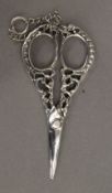 A pair of silver scissors