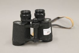 A pair of Carl Zeiss Jenoptem 8 x 30 W binoculars