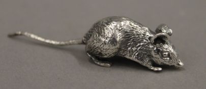 A silver model of a mouse