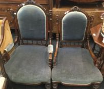 A Victorian walnut salon armchair and another en-suite