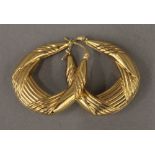 A pair of 9 ct gold earrings (4.