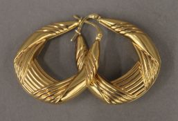 A pair of 9 ct gold earrings (4.