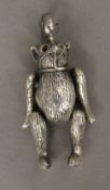 A silver model of a teddy bear