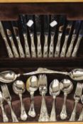 An Irish silver plated six-place setting canteen of cutlery, Kings pattern,