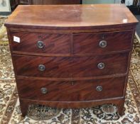 A 19th century mahogany bow front chest of two short over two long drawers, with crossbanded top,