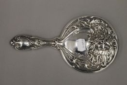 An Art Nouveau EPNS hand mirror,