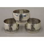 A set of three Egyptian niello decorated white metal napkin rings