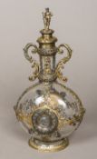 A 19th century Continental silver mounted clear glass decanter,