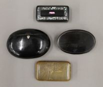 Two Victorian horn snuff boxes and two Victorian papier mache snuff boxes