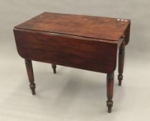 A 19th century mahogany drop flap Pembroke table,