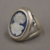 A silver cameo ring